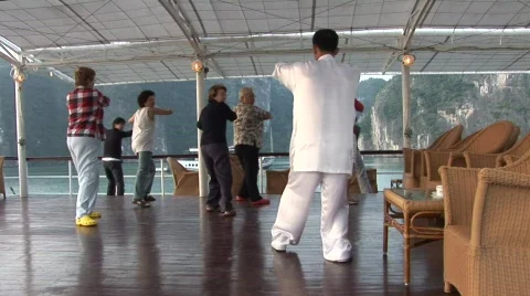 Tai Chi class on deck, Vietnam Stock Footage