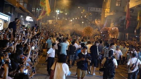 Tai Hang Fire Dragon Dance  celebrating on Hong Kong streets Stock Footage 102312643
