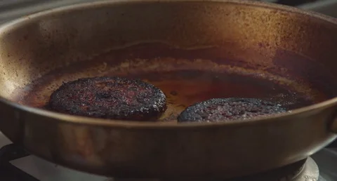 Taiking off two hamburger meat from burned pot Stock Footage 75848258