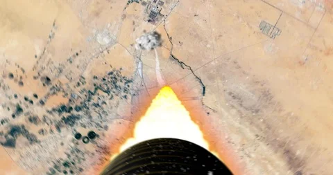 Tail camera view, turbulent rocket ascent over desert terrain in Saudi Arabia. 스톡 동영상 100421504