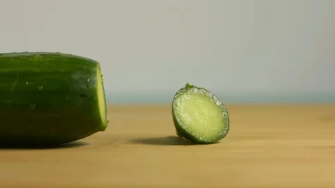 Tail of cucumber on the table in the kitchen Stock Footage 128917718