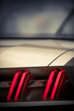 Tail lights of a supercar Stock Photos