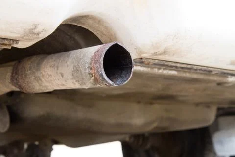 Tail pipe of an old beater Stock Photos