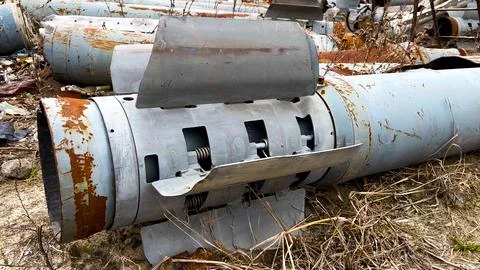 The tail section of a multiple rocket launcher Hurricane on the ground in dry Stock Photos