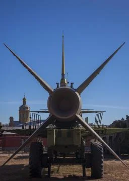 Tail of Soviet two-stage anti-aircraft guided missile against the blue sky. Stock Photos