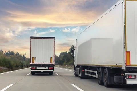 Tail view white blank modern delivery big shipment cargo commercial semi trailer 스톡 사진