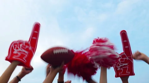 Tailgate: Group Of Fans Cheer Against Blue Sky Stock Footage