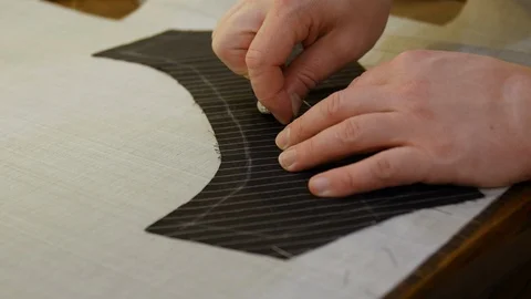 Tailor basting collar. a seam or trim is placed until it can be permanently Stock Footage 127333878