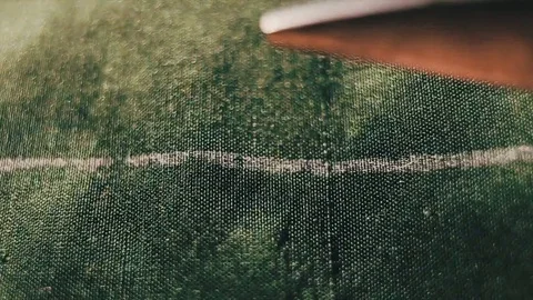 Tailor cutting fabric using large scissors or shears as he follows the chalk Vídeo Stock 86450291