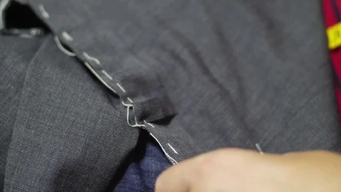 Tailor cutting line with scissors slow motion Stock Footage 79835845