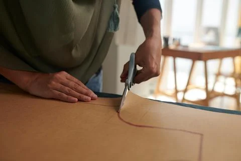 Tailor Cutting out Sewing Pattern Stock Photos