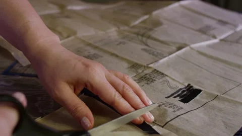 Tailor Cutting Patterns With Scissors Vídeos de archivo 243613195