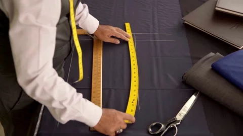 Tailor is Dawning Pattern Using Tailor's scale Stock Footage 163189581
