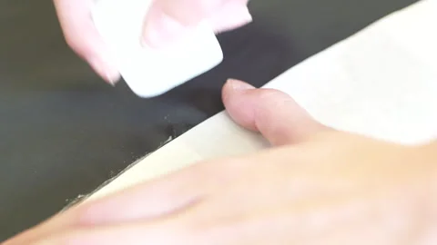 Tailor Draws Sketch On Textile Using Stencil And Soap Video Stock Footage 267014781