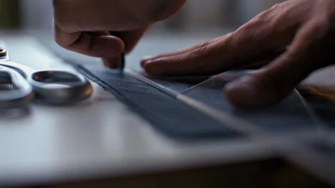 Tailor Hands Making a Pattern on the Fabric before Sew Fashionable Clothes Video stock 90471001