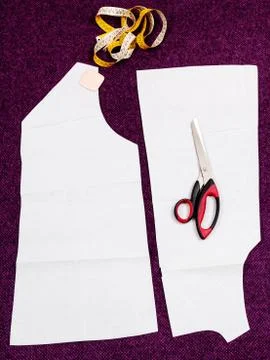Tailor instruments and pattern cutting of clothes Stock Photos