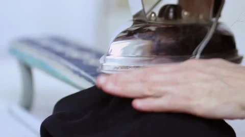 Tailor ironing a jacket 스톡 동영상 24375714