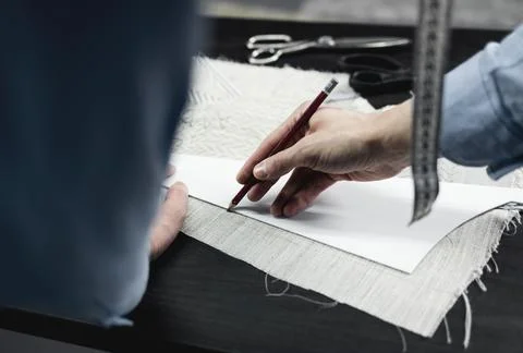 Tailor makes pattern on fabric Stock Photos