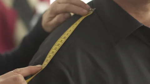 Tailor Making Shoulder Measuring On A Customer. Handheld. Low Angle Stock Footage 264277725