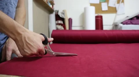 Tailor man cuts fabric Scissors Stock Footage 68315931
