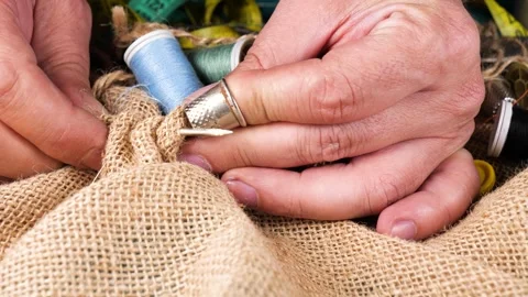 Tailor man is sewing. Close-up of a hand holding a needle Stock Footage 278184182