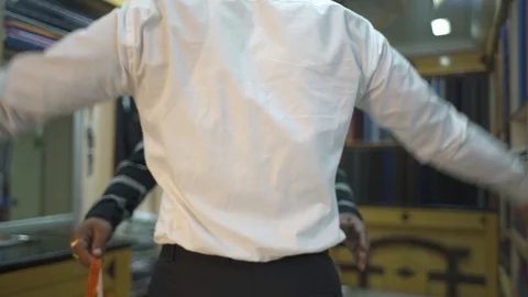 Tailor Measuring Width Of Man Chest View From Back. Video stock 113199767