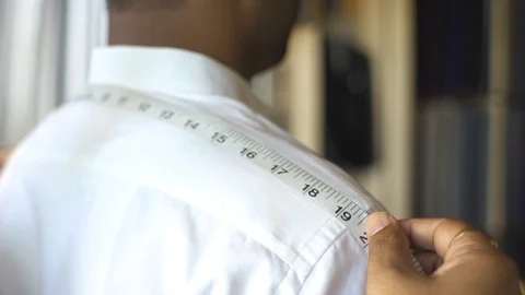 Tailor Measuring Width Of Man Shoulders, Closeup Shot Stock Footage 113199459