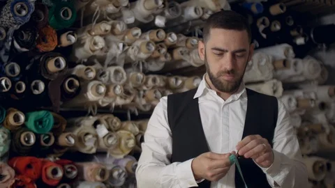 Tailor over work desk during work, fashion designer at workshop Stock Footage 109328503