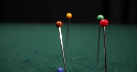 Tailor pins on green background, Close-up of a tailor's desk with tailoring Stock Footage 172351660