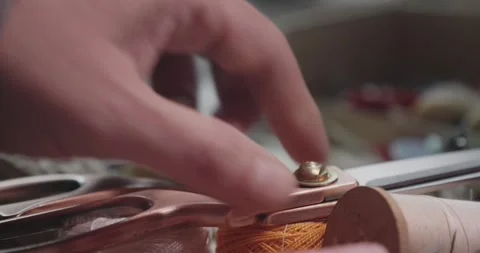 Tailor Placing Cutting Scissors onto Cotton Thread Spools Close Up 库存影片 341936536
