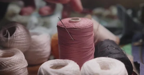 Tailor Placing Sewing Needle into Cotton Thread Cone Close Up 库存影片 341936462
