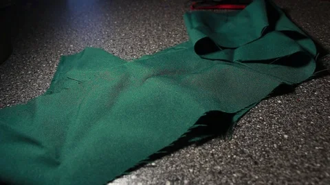 Tailor prepares the table for work. Video stock 104825923