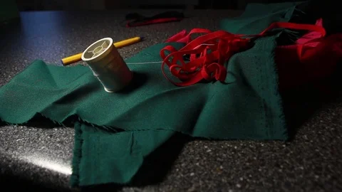 Tailor prepares the table for work. 動画素材 104825947