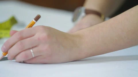 Tailor preparing patterns to sew Stock Footage 62353932