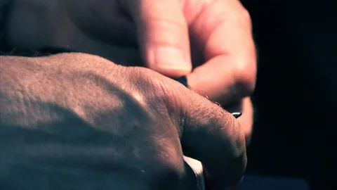 The tailor rips clothes with his hands Stock Footage 94148592