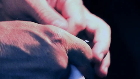 The tailor rips clothes with his hands Stock Footage 94149527