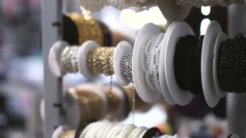 Tailor selects accessories with windows for decoration of clothes Stock Footage 72102480