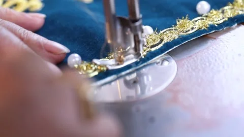 The tailor is sewing clothes with a sewing machine 3 Video stock 311645726