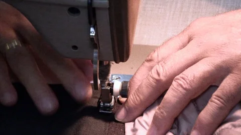 The tailor sews on the sewing machine Stock Footage 94395952