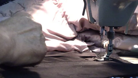 The tailor sews on the sewing machine Stock Footage 94401444