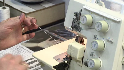 The tailor sews on the sewing machine Stock Footage 94955974