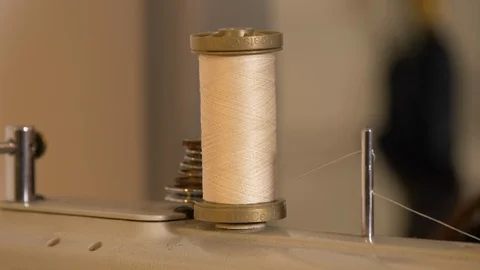 Tailor spool turns 動画素材 119438146