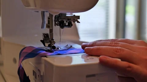 Tailor Stitching Cloth Fabric on Electric Sewing Machine, Close Up View Stock Footage 344054101