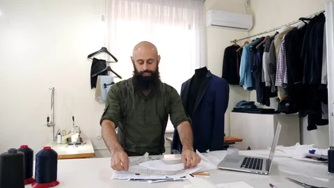 Tailor takes a meter off his neck Stock Footage 80736661