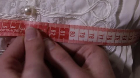 The tailor is taking measurements 8 Stock-Footage 320504079