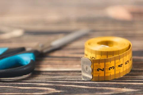 Tailor tool. meter and scissors Stock Photos