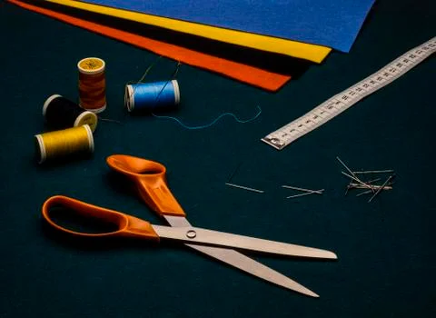 Tailor tools, fabric, scissors, thread, meter, pins Stock Photos