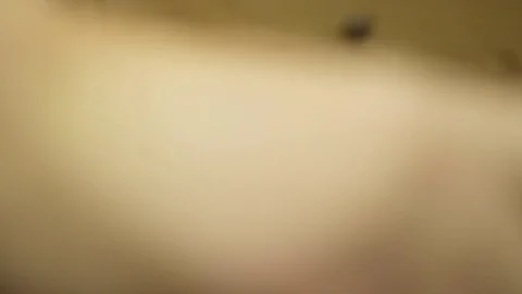 Tailor using fabric to make pants Stock Footage 79835635