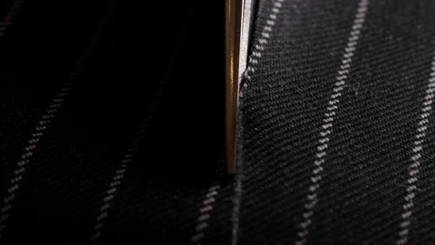 Tailor work: DIY tailor scissors or shears cut cotton wool fabric with a pair of Stock Footage 138736114