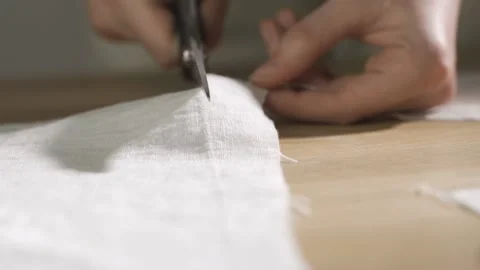 Tailor work: Process of creating from fabric cutting along the tailor chalk Stock Footage 151465351